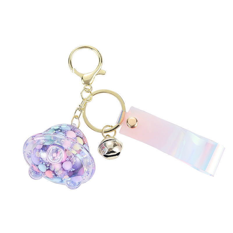 Wholesale Acrylic Fueled Spaceship Astronaut Luminous Quicksand Bottle Keychain